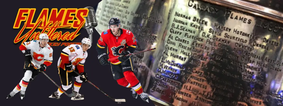Hockey player in red jersey skating on ice near a Stanley Cup trophy.