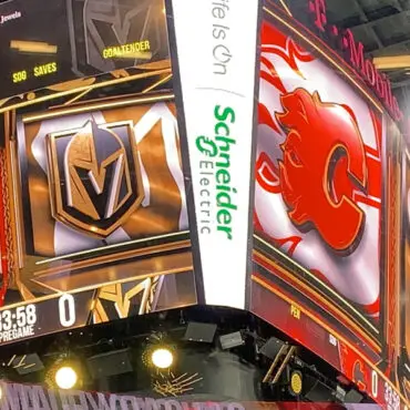 Scoreboard showing Vegas Golden Knights and Calgary Flames hockey game.