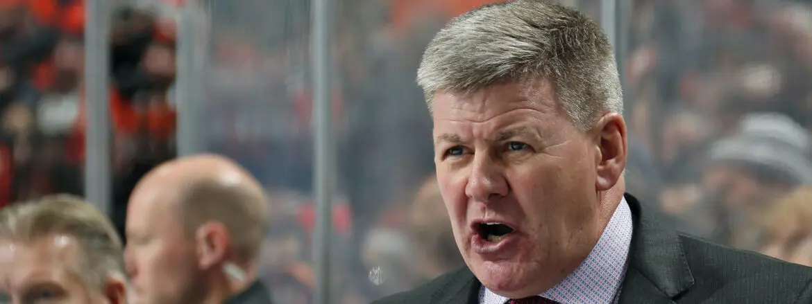 A man passionately speaking or shouting during an event.