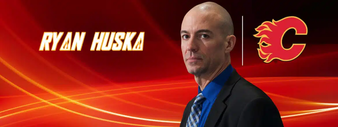 Professional man in suit with red abstract background and text.