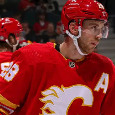 Calgary Flames hockey player focusing during a game.