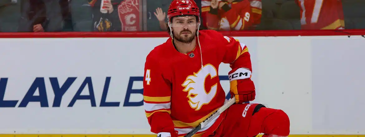 Calgary Flames hockey player in red jersey during a game.