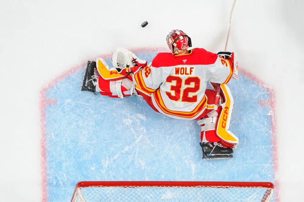 Purple podcast icon with a microphone symbol in the center.