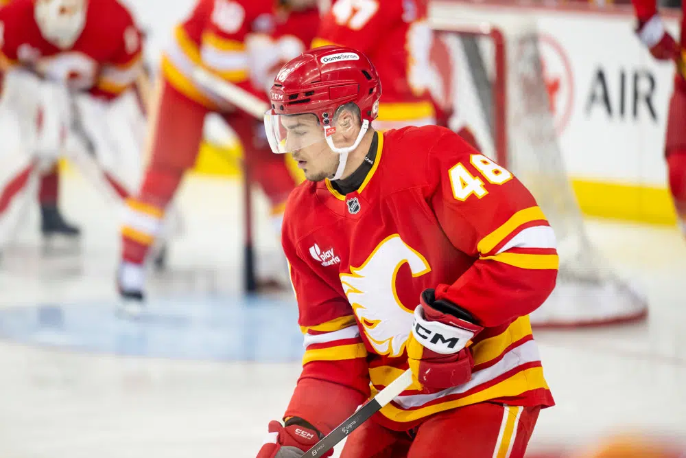 Purple podcast icon with a microphone symbol in the center.